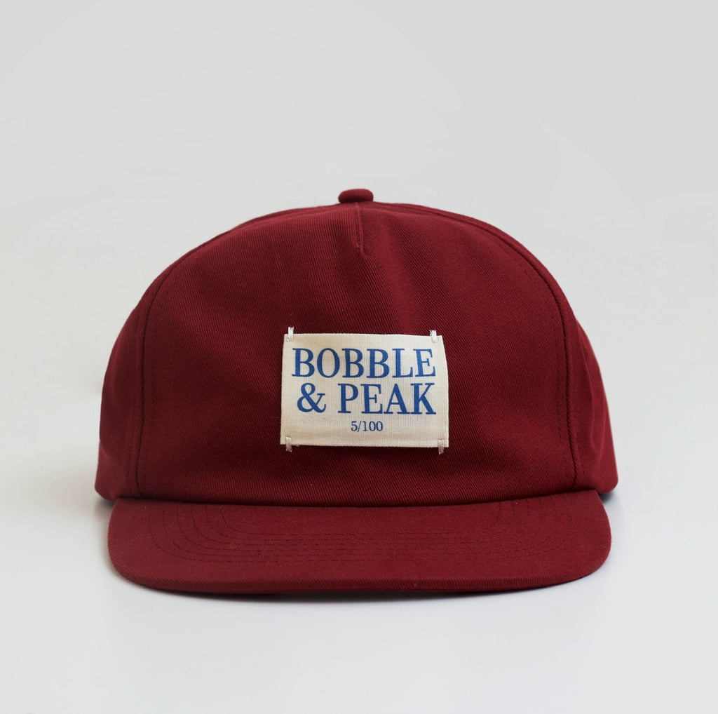 Bobble & Peak limited edition claret hat front view small-batch headwear